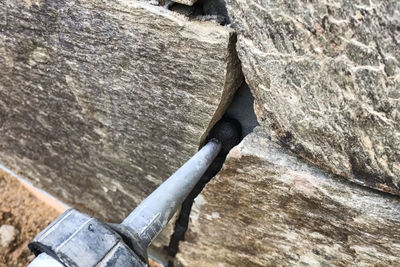 High angle view of water flowing through rocks