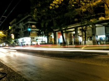 Light trails on city street at night