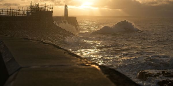 Scenic view of sea against sky during sunset