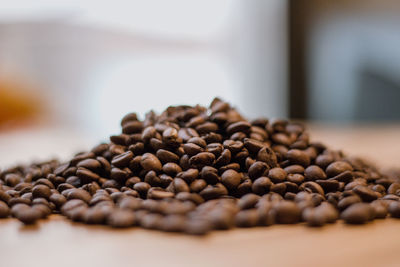 Close-up of coffee beans on table