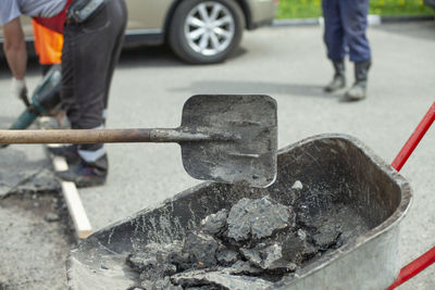 Low section of men working on road