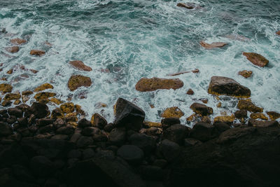 Close-up of rocks on shore