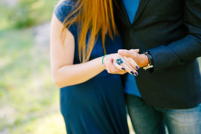 Close-up of woman holding hands