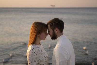 Kaliningrad, russia. young couple in love on the seaside