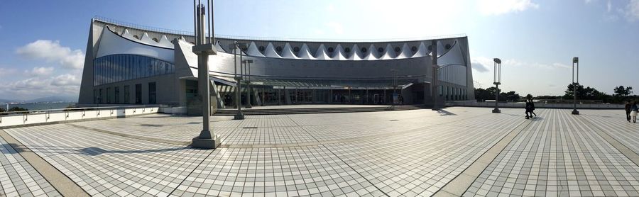 Built structure against cloudy sky