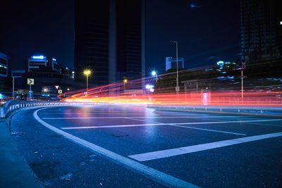 Light trails on road at night