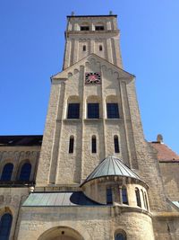 Low angle view of building against clear blue sky