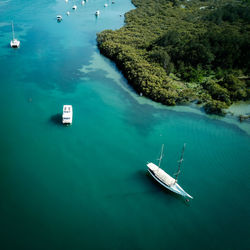 High angle view of sailboat in sea