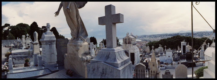 Panoramic view of church against cloudy sky