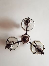 Close-up of lamp against white background