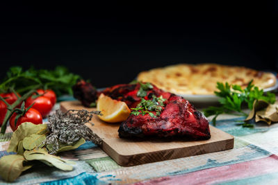 High angle view of food on table against black background