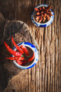 High angle view of red chili peppers on table
