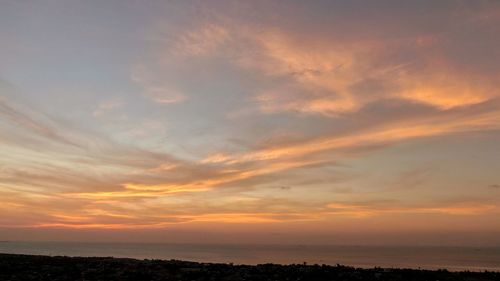 Scenic view of sunset over sea