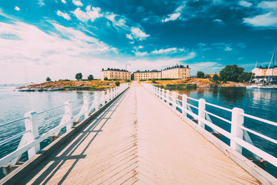 Bridge over river against sky