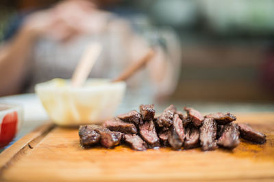 Close-up of meat on cutting board