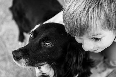 Close-up of boy with dog 