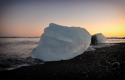 Scenic view of sea against sky during sunset at jokulsarlon glacier lagoon, iceland