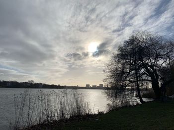 Scenic view of lake against sky during sunset