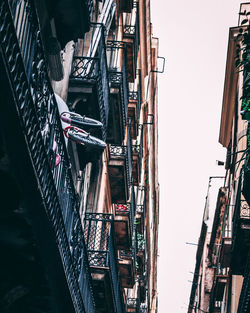 Low angle view of buildings against clear sky