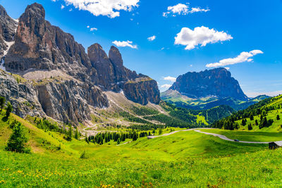 Scenic view of landscape and mountains against sky