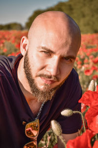 Close-up portrait of man wearing sunglasses