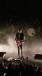 View of guitar at music concert