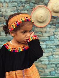 A girl in folk costume for jizan