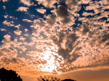 Low angle view of clouds in sky during sunset
