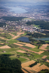 Aerial view of patches of cultivated land and houses