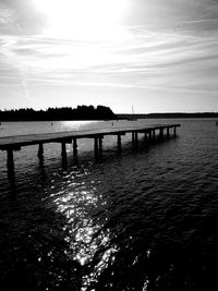 Pier on sea against sky