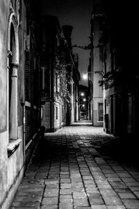 Empty walkway at night