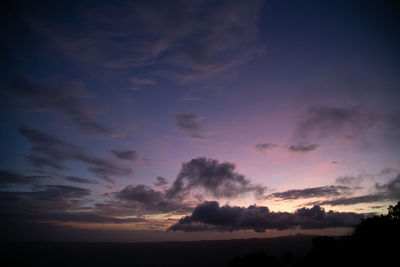 Low angle view of dramatic sky during sunset