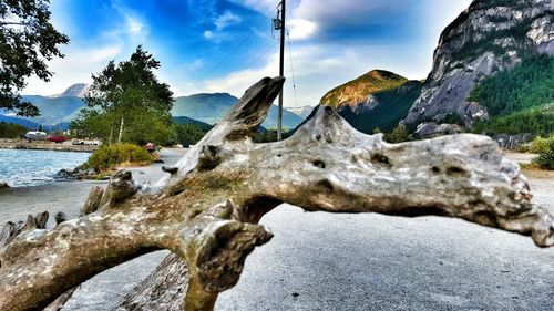 Scenic view of mountains against cloudy sky