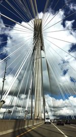 Low angle view of ferris wheel against sky