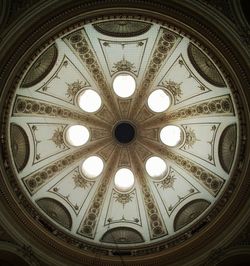 Low angle view of illuminated ceiling