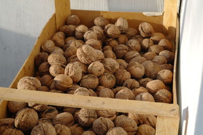 High angle view of walnuts in container