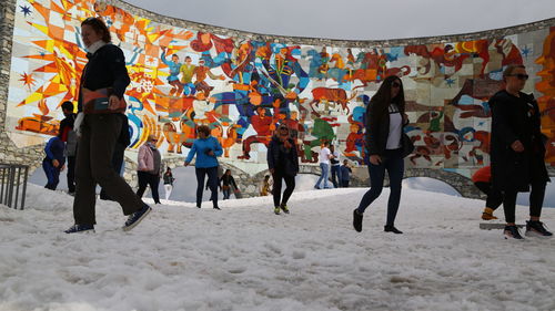 Group of people on the wall