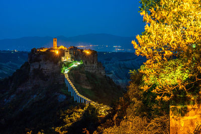 High angle view of illuminated buildings at night