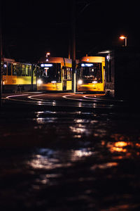 Illuminated street lights at night