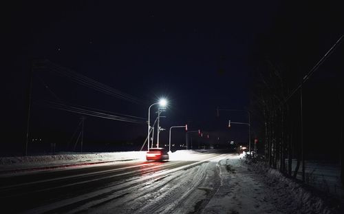 Cars on road at night