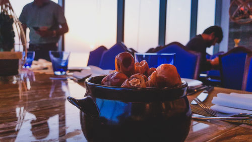 Group of people in plate on table