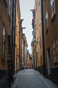 Street amidst residential buildings