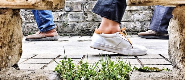 Low section of man and woman