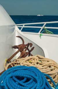 Boat in sea against blue sky