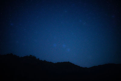 Low angle view of stars against sky at night