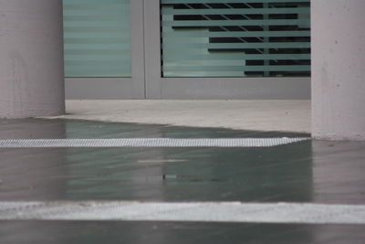 Reflection of building on glass door