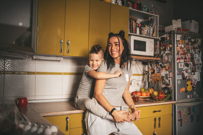 Mother and daughter at home