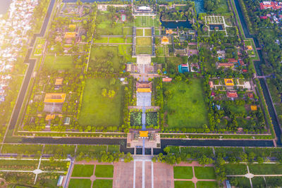 High angle view of swimming pool by building in city