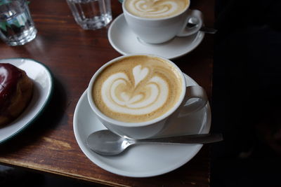 High angle view of cappuccino on table