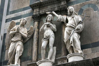 Low angle view of statue in city in florence italy